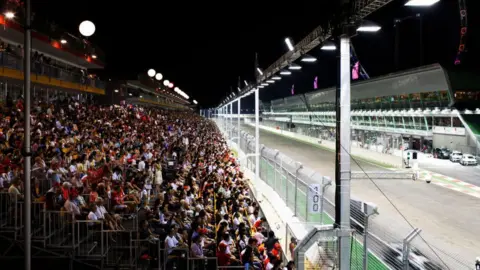 Getty Images Singapore's F1 Grand Prix brings thousands of overseas visitors each year