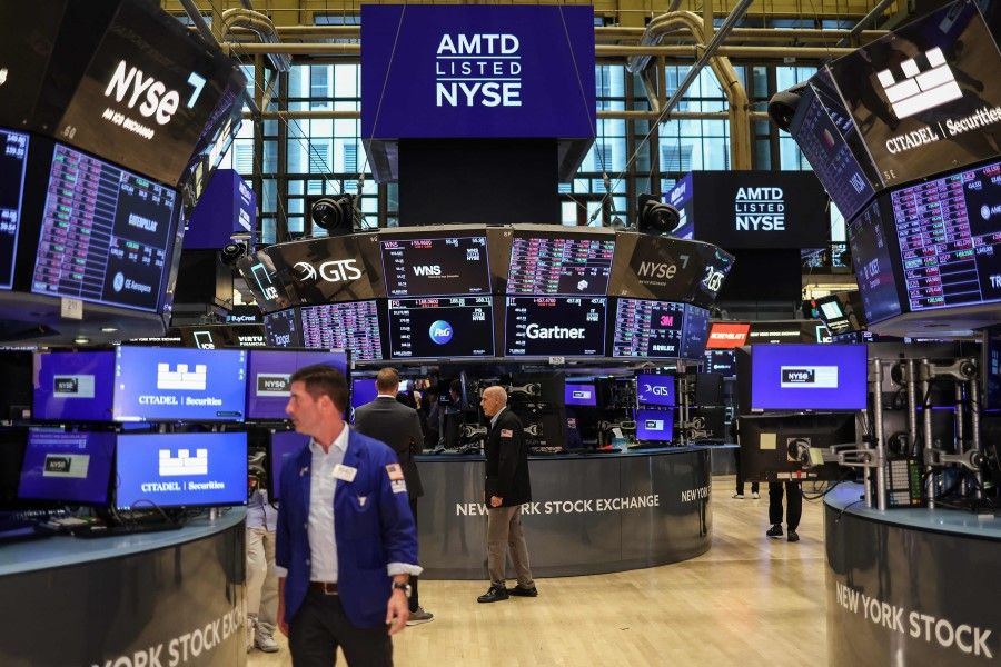 Traders work on the floor of the New York Stock Exchange (NYSE) ahead of the closing bell in New York City on 5 August 2024. (Charly Triballeau/AFP)