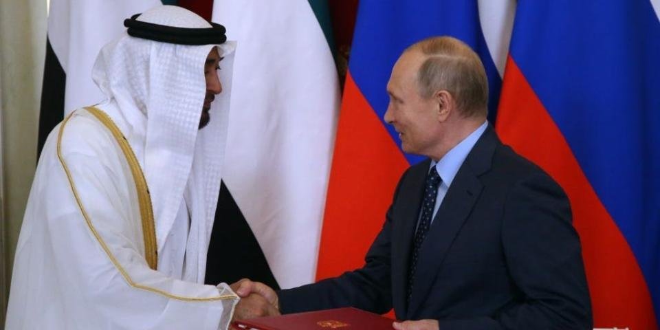 Putin shakes hands with Abu Dhabi's Crown Prince Sheikh Mohammed bin Zayed bin Sultan Al-Nahyan